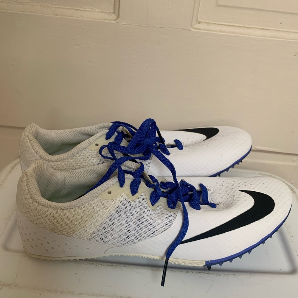 White and Blue Athletic Shoes with Black Swoosh